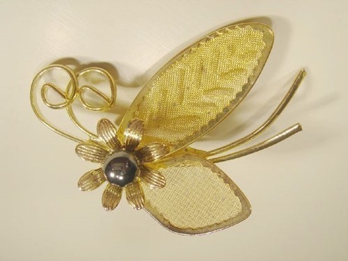 Schmetterling goldfarben